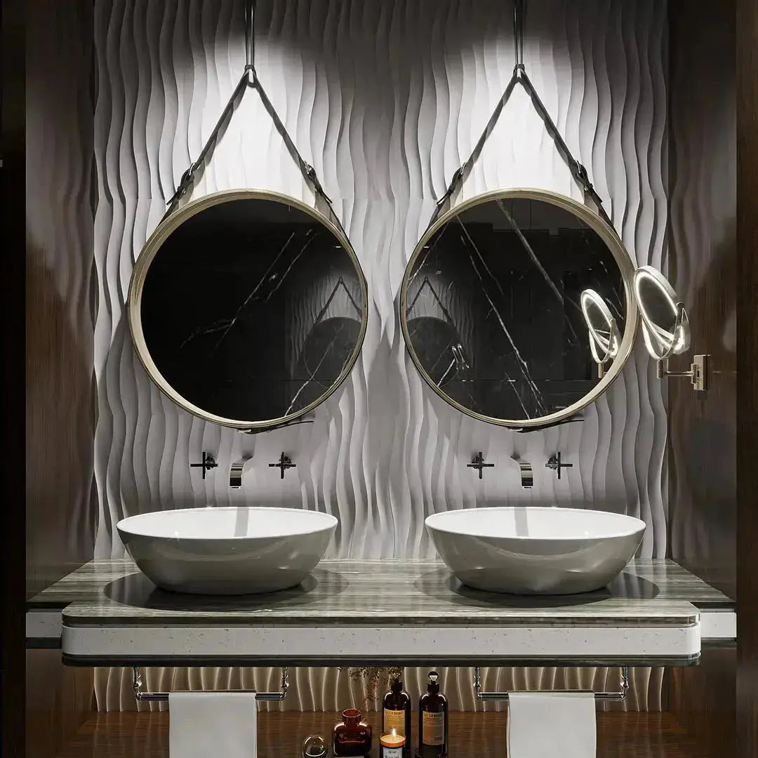 Bathroom setup with two round mirrors, sinks, and decorative elements. 3d wall panel 12x24 tile - fix and flip -corte de laja
losas grandes de pizarra
venta de piedra
camino de piedra natural