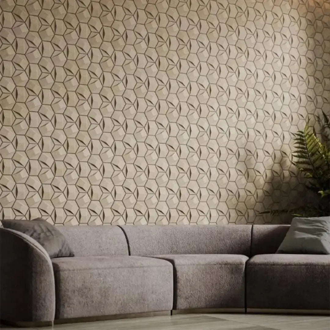 Gray sectional sofa against a textured beige wall with geometric pattern