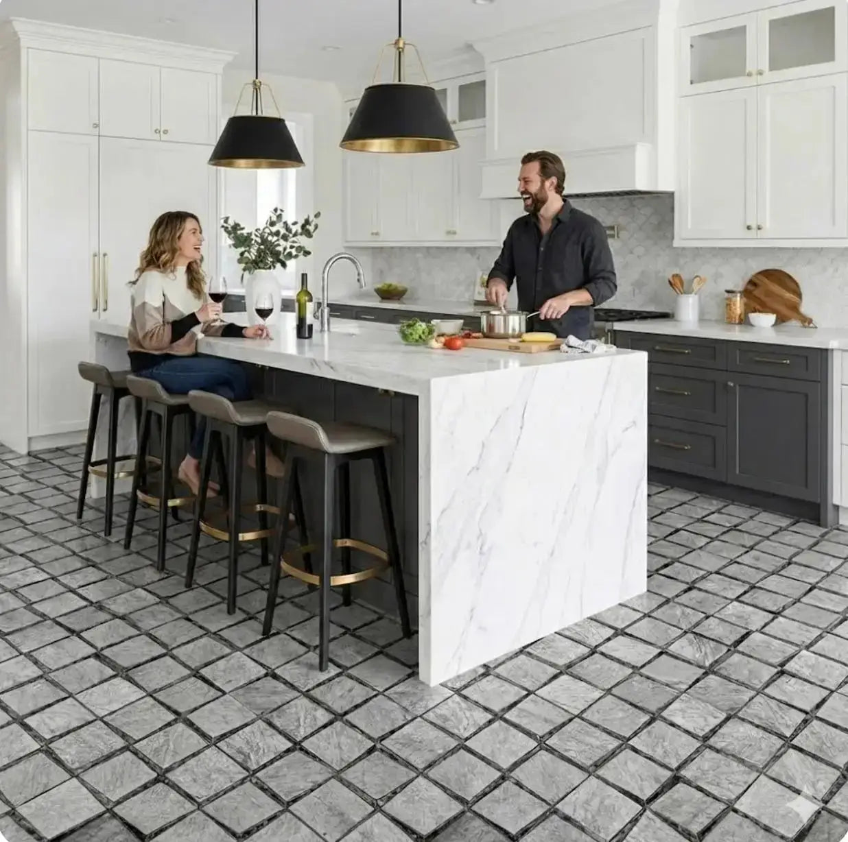 Modern kitchen with white marble island and gray tiled floor