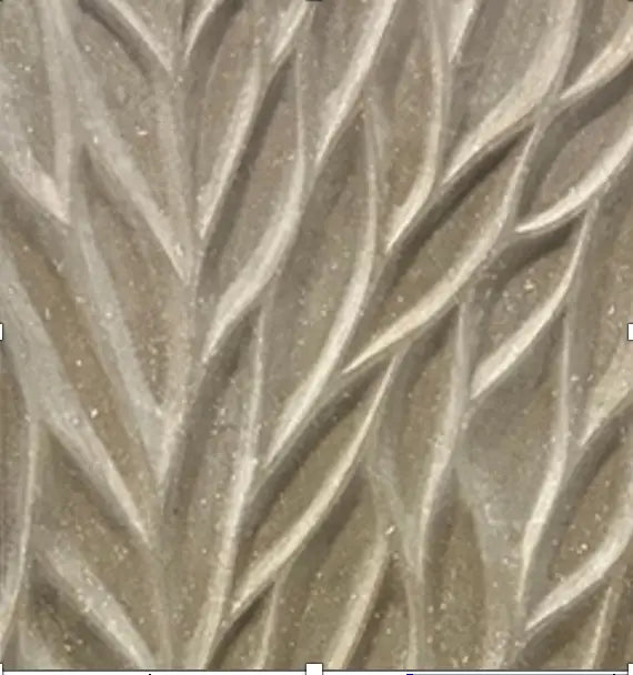Cielo natural stone 3D wall panel featuring an intricate, carved organic leaf or feather pattern in a warm beige or travertine-like tone with a heavily textured, multidimensional sculpted surface.