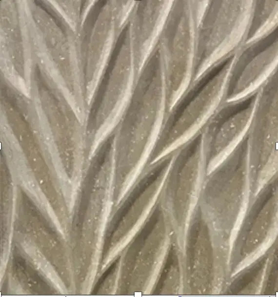 Cielo natural stone 3D wall panel featuring an intricate, carved organic leaf or feather pattern in a warm beige or travertine-like tone with a heavily textured, multidimensional sculpted surface.