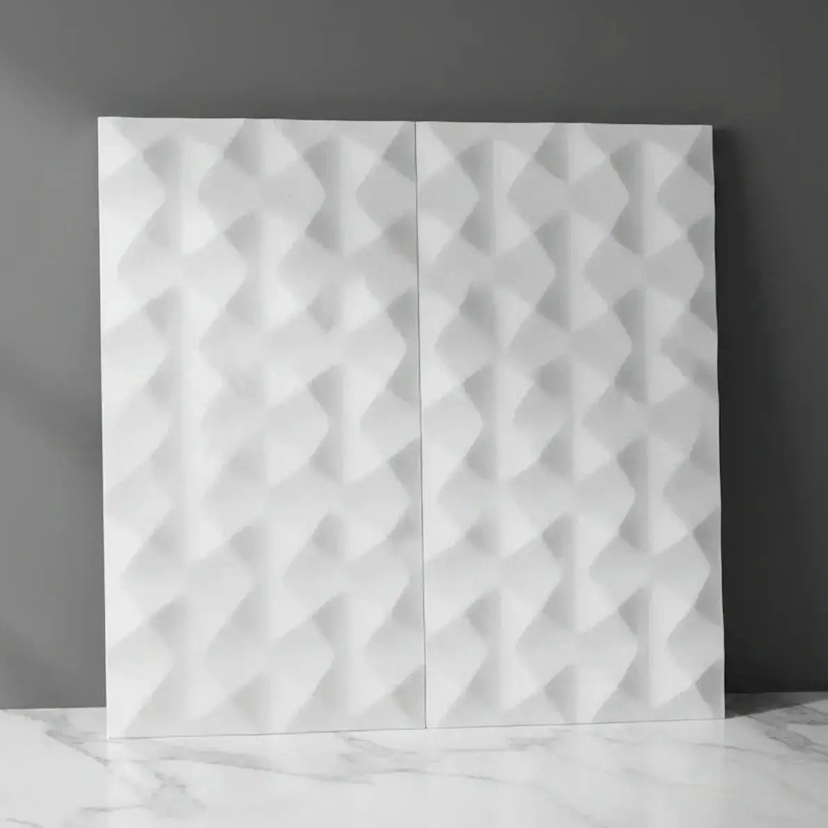 White textured wall panels on a gray background misbell house of tiles
tile refinishing
tile installers
classic tile
tile showroom
tile suppliers
tile installers near me
