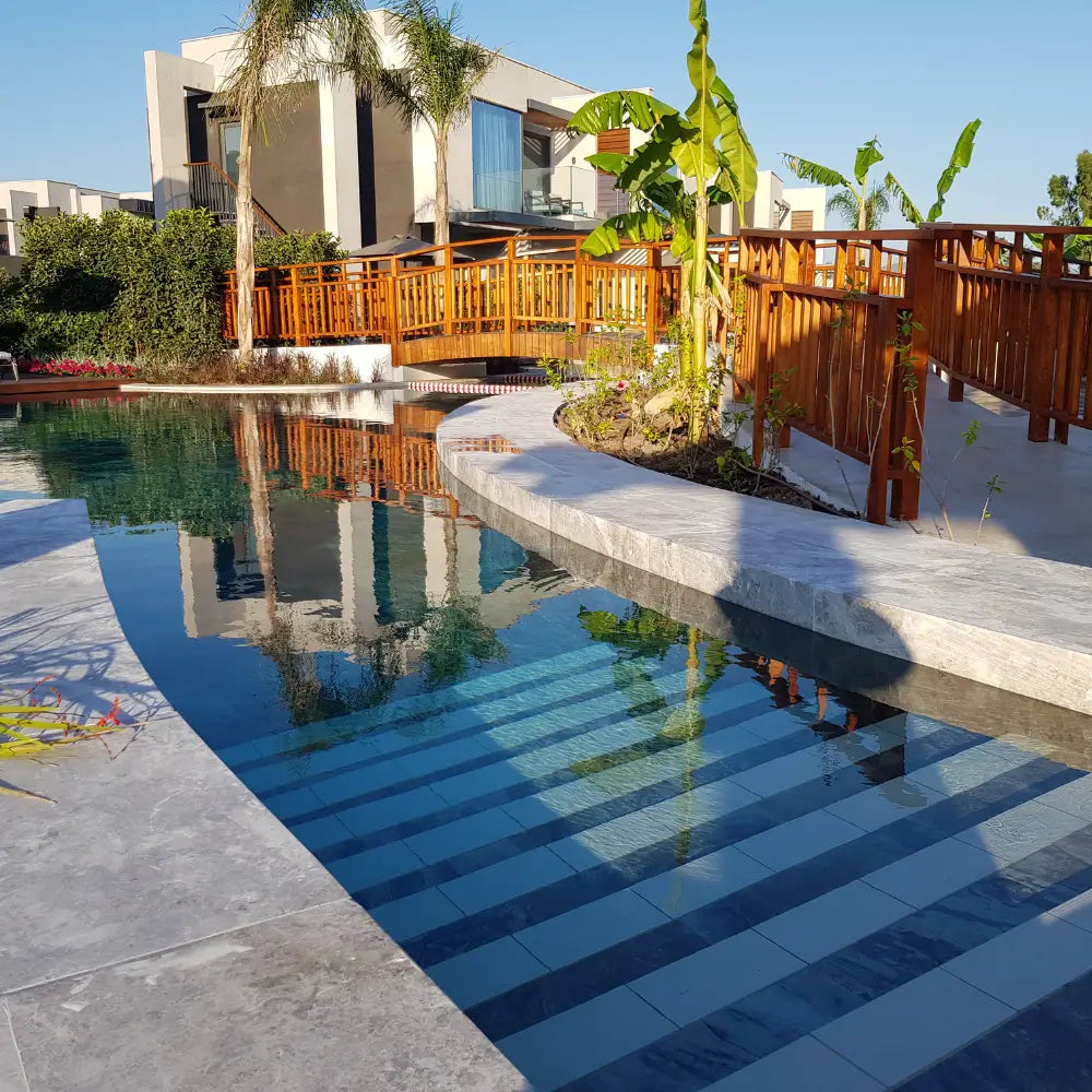 How Natural Stone Coping Elevates Pool and Patio Design