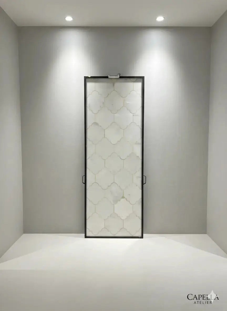 Decorative glass door with geometric pattern in a minimalistic room setting marble mosaic tile -tile contractor near me 
my tiles
regrouting shower tile
high end tile
the marble
marble palace
marble line
marble kitchen worktops